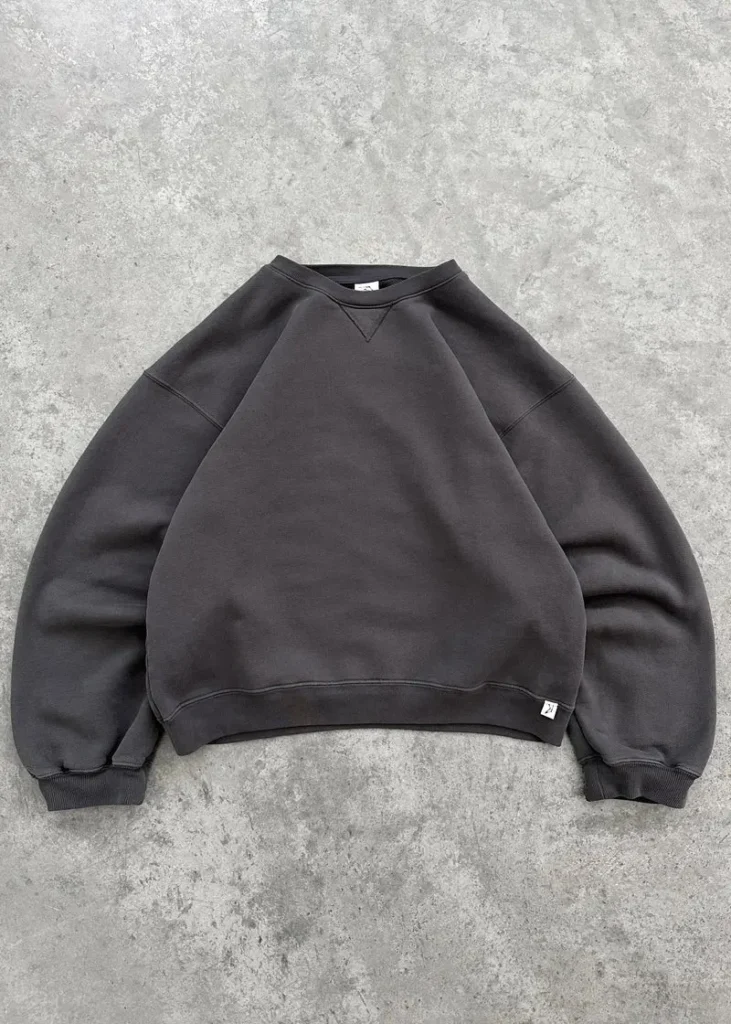 Akimbo Crewneck Charcoal front view with simple crewneck design